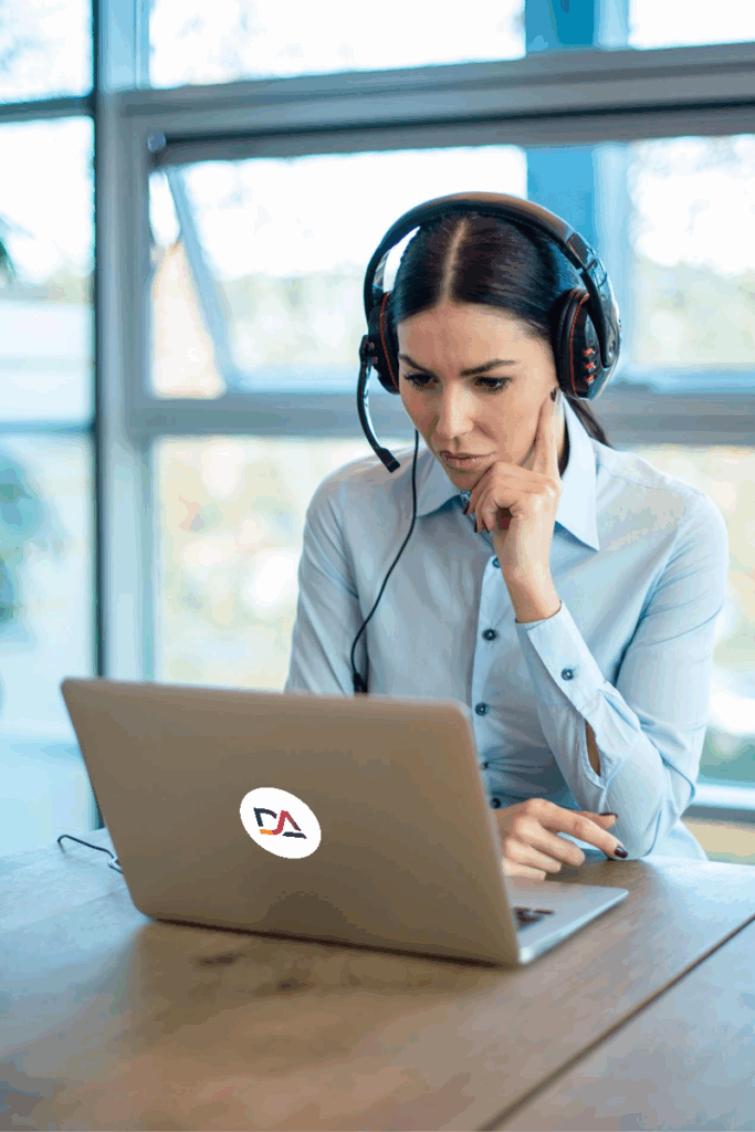 professional in a workplace setting, likely involved in communication or customer support.